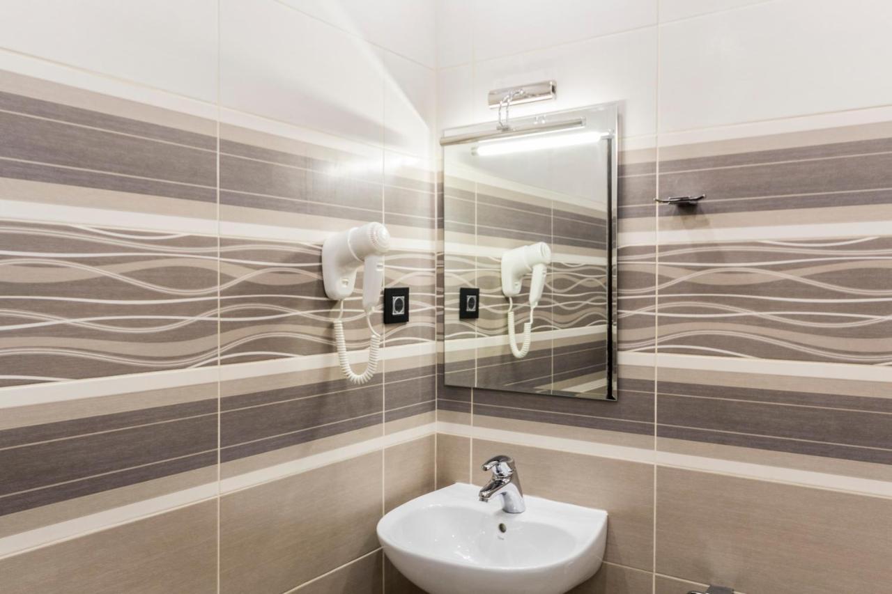 Madison Inn Suites - Wilson'S Square Белград Номер фото